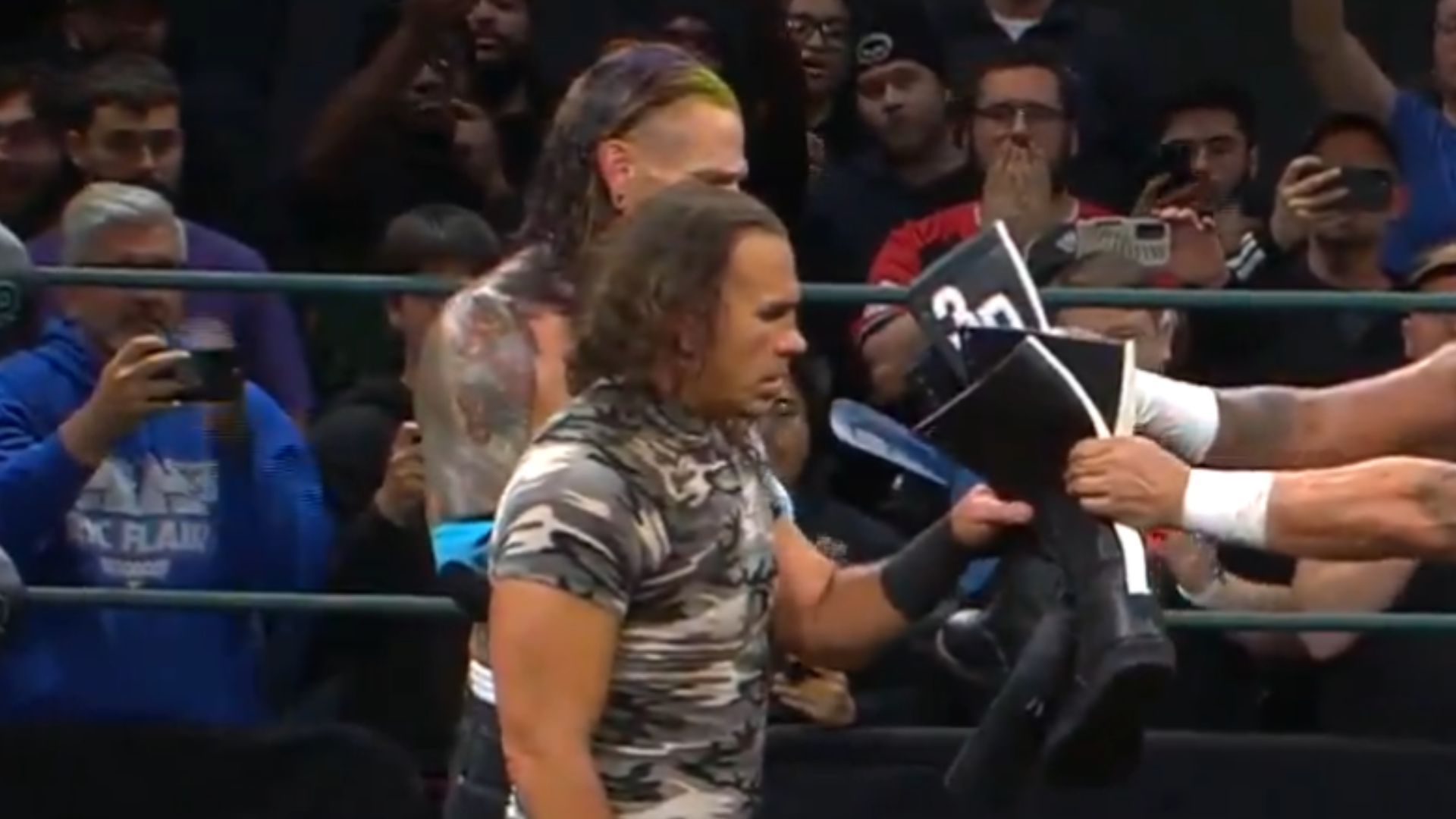The stars handed over their boots (Credit: TNA on X)