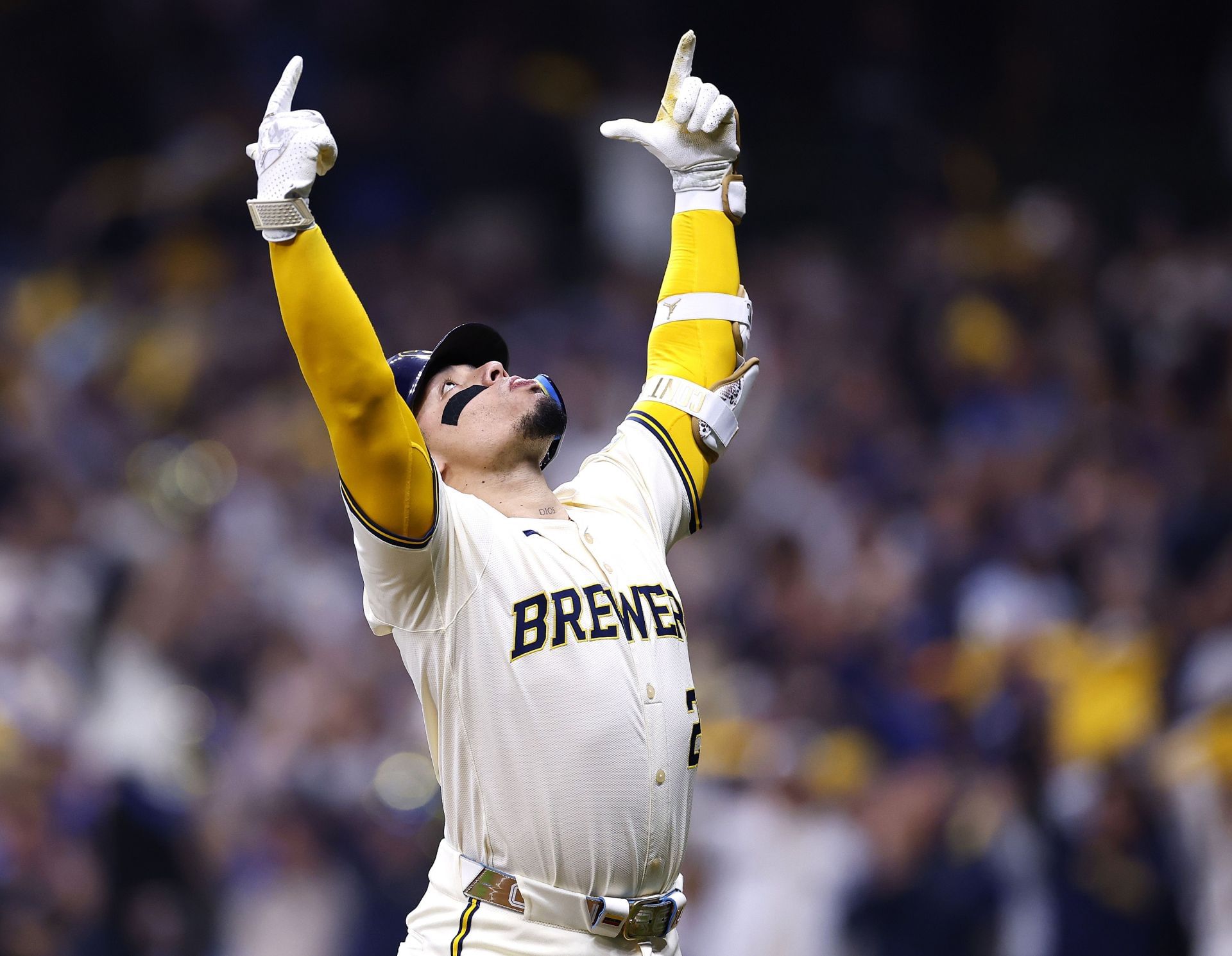 William Contreras celebrates after hitting a home run against the Chicago Cubs in Game Five of the NLDS - Source: Getty