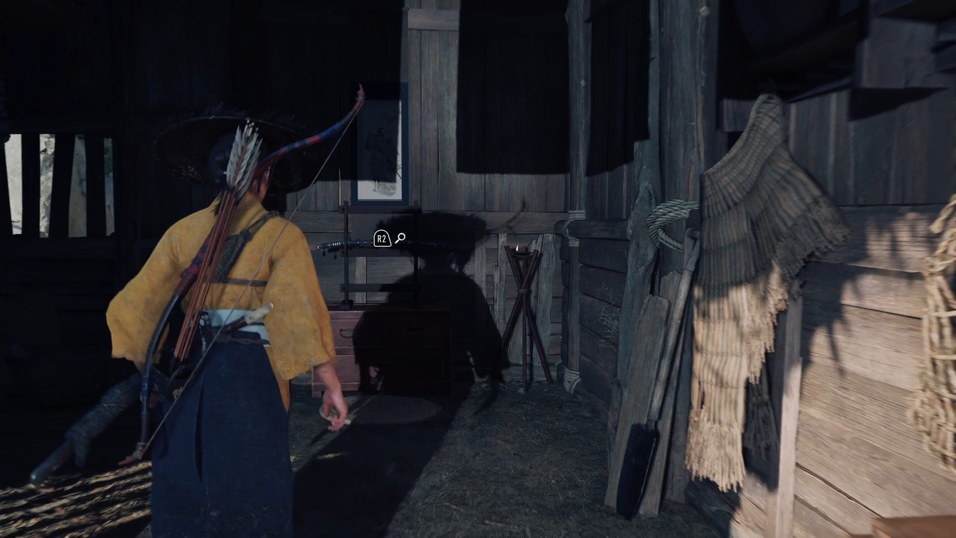 Interact with the Katana inside the hut (Image via Sucker Punch)