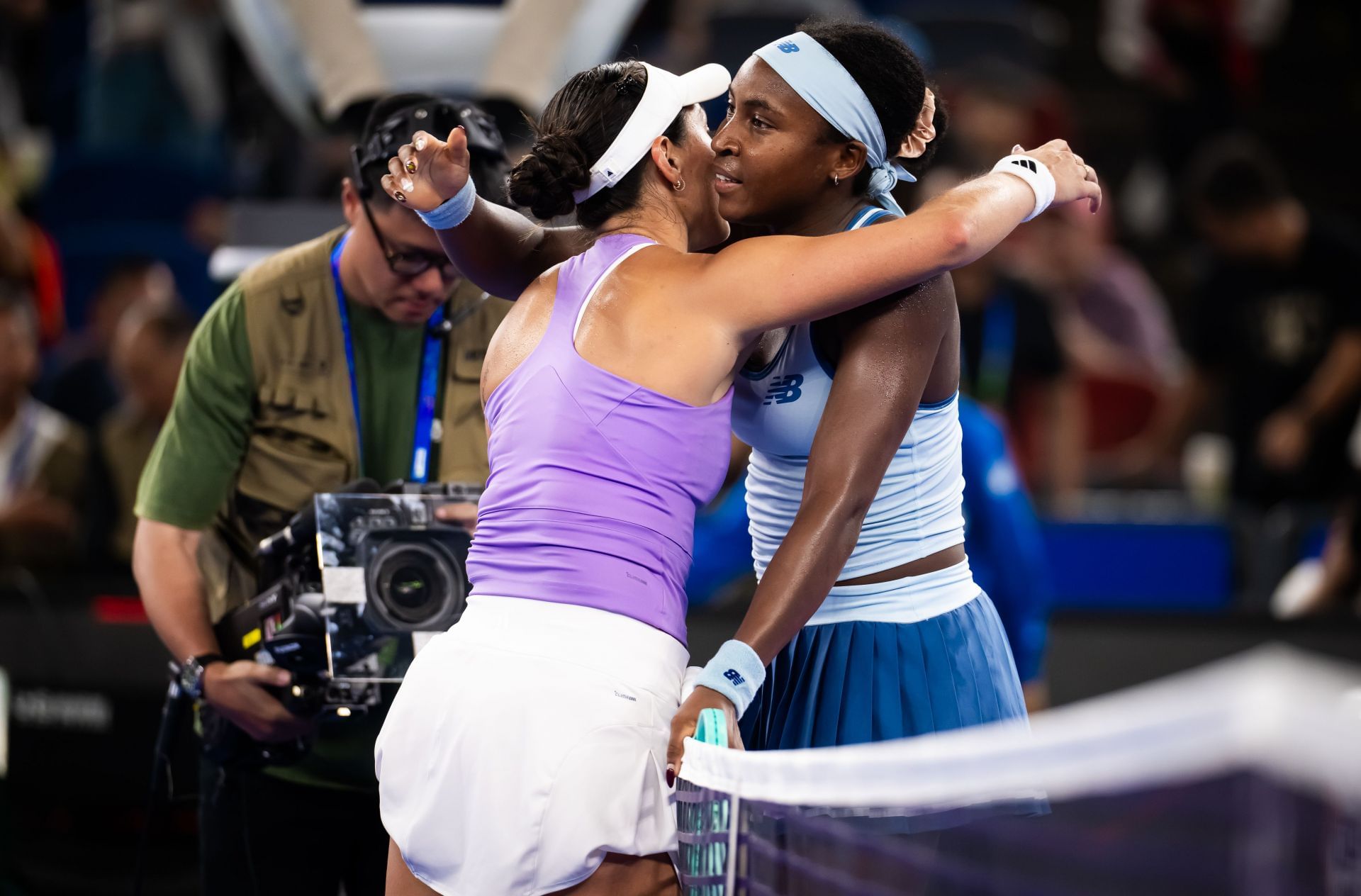 Coco Gauff embraces Jessica Pegula at the net after winning the 2025 Wuhan Open women&#039;s singles final (Source: Getty)