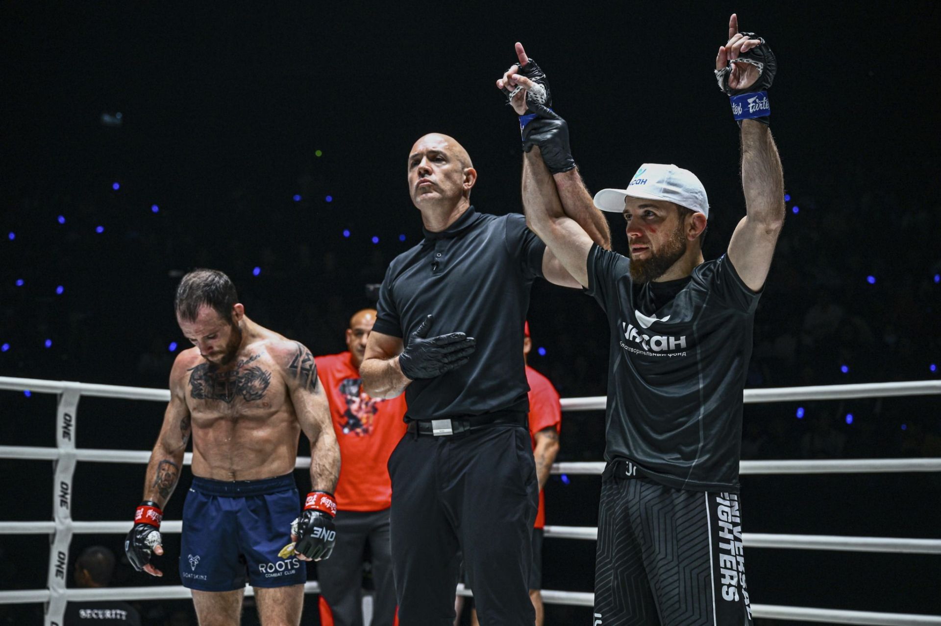 Mansur Malachiev (R) beats Jarred Brooks | Photo credit: ONE Championship