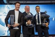 Scott Dixon, Chip Ganassi, and Alex Palou with their trophies at the NTT INDYCAR Series Season Awards - Source: Getty