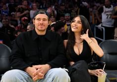 Justin Herbert goes viral for protecting Madison Beer from flying ball as Chargers QB enjoys courtside date with "Bittersweet" singer [PHOTO]
