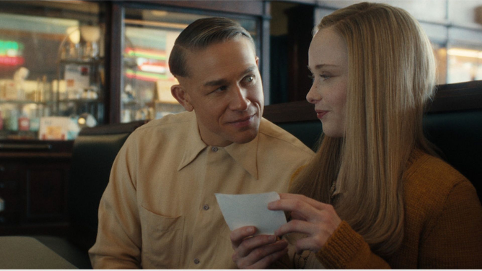 Charlie Hunnam as Ed Gein with Suzanna Son as Adeline in Monster: The Ed Gein Story. (Image via Netflix)