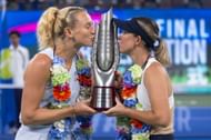 Katerina Siniakova and Storm Hunter pose with Wuhan Open doubles title | Image Source: Getty