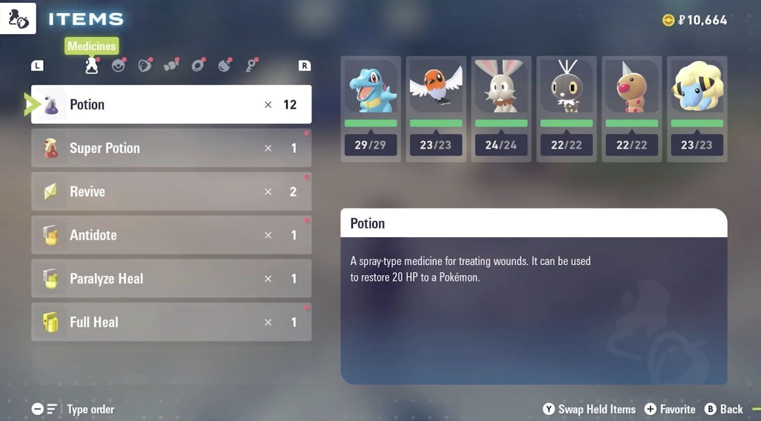 Use potions to heal in Pokemon Legends (Image via The Pokemon Company)
