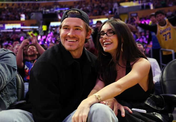 WATCH: Justin Herbert, Madison Beer turn heads at Dodgers-Blue Jays World Series enjoying romantic date in suite