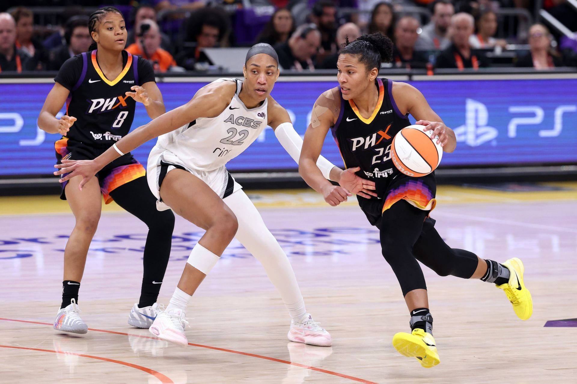 Alyssa Thomas #25 of the Phoenix Mercury drives to the basket against A&#039;ja Wilson #22 of the Las Vegas Aces during Game Four of the 2025 WNBA Playoffs finals at Mortgage Matchup Center on October 10, 2025 in Phoenix, Arizona. - Source: Getty
