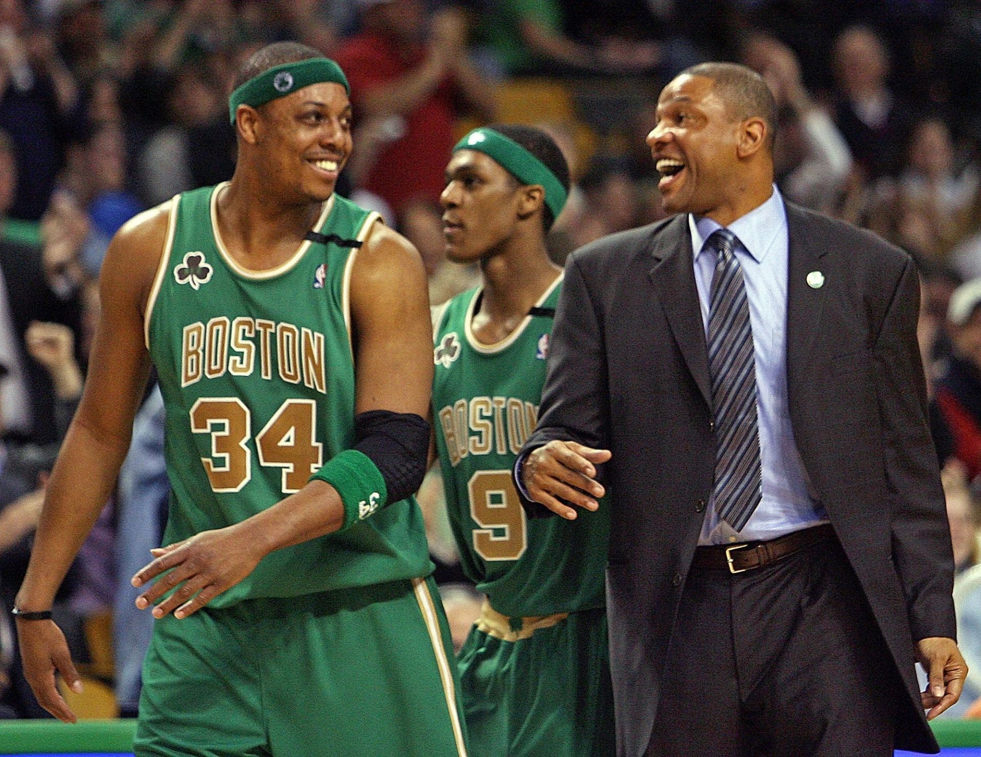 (031407 Boston, MA) Boston Celtics Vs Atlanta Hawks at the Garden. Boston Celtic Captain Paul Pierce celebrates with Boston Celtic Head Coach Doc Rivers after Boston Celtic Guard Rojon Rondo makes a three point shot at the buzzer in the 2nd quarter - Source: Getty