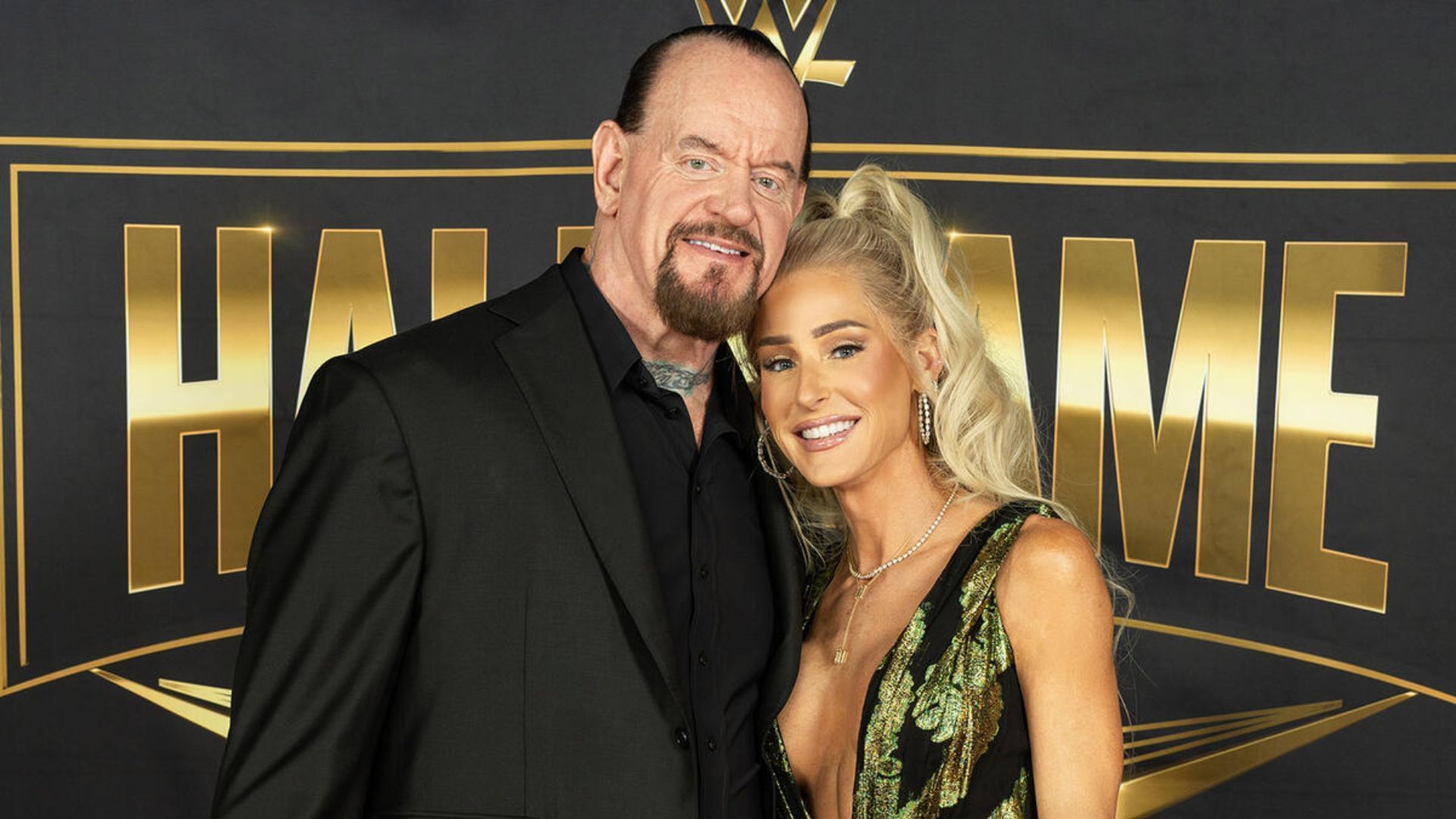 The Undertaker and Michelle McCool at the Hall of Fame ceremony [Image: WWE.com]