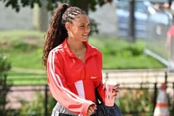 Trinity Rodman poses in 'DIY' outfit featuring red jacket and denim