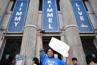 Protestors gather outside Jimmy Kimmel's studio to criticize his suspension (Image via Getty)