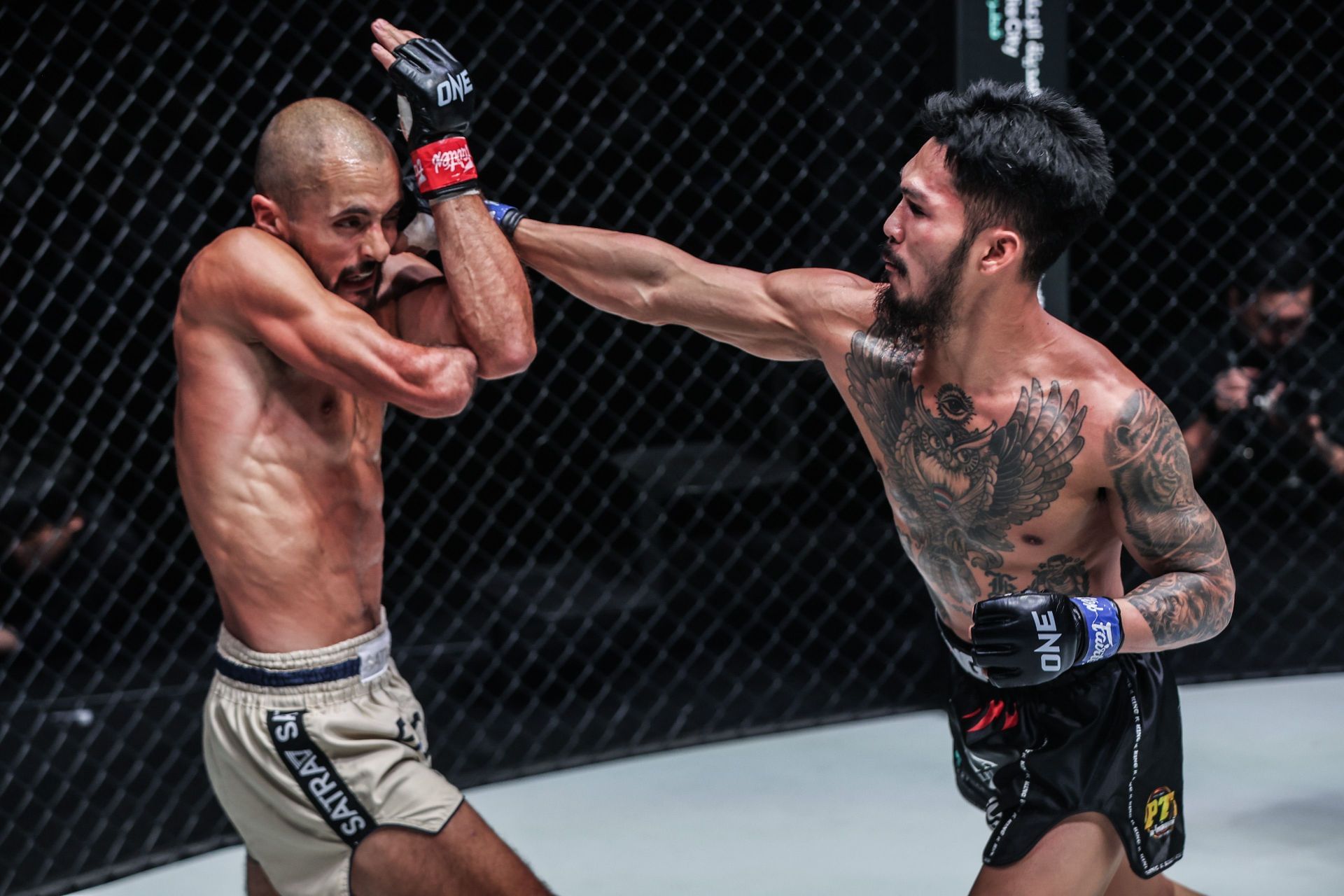 (From left) Jake Peacock and Suakim in action at ONE 173 in Japan. [Image: ONE Championship]