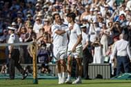 Fabio Fognini (left) and Carlos Alcaraz (right) after the conclusion of their first-round match at the 2025 Wimbledon Championships (Source: Getty)