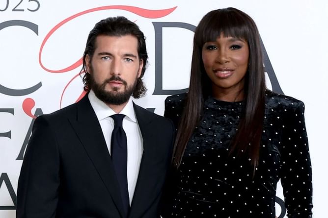 Venus Williams' fiancé Andrea Preti gushes over American's glamorous black velvet midi dress look at CFDA Fashion Awards