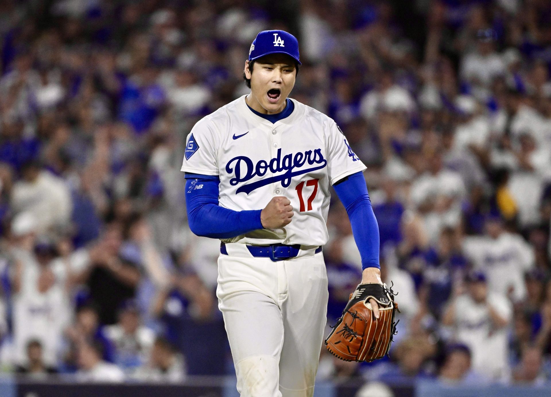 Shohei Ohtani hits three home runs and strikes out 10 batters as the Los Angeles Dodgers defeated the Milwaukee Brewers 5-1 to win game 4 and the NLCS. - Source: Getty