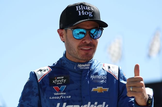 NASCAR champion Kyle Larson erupts with a sarcastic reaction after a violent midget car wreck in USAC