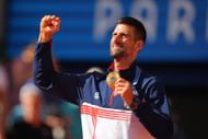 Novak Djokovic celebrates his men's singles gold medal win at the 2024 Paris Olympics (Source: Getty)
