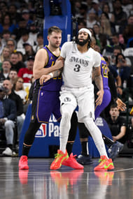 Los Angeles Lakers guard Luka Doncic (77) and Dallas Mavericks forward Anthony Davis (3) in action during the game between the Dallas Mavericks and the Los Angeles Lakers at American Airlines Center. Mandatory Credit: Jerome Miron-Imagn Images