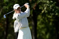 Charley Hull dons black as she practices her swing amid a break from professional golf