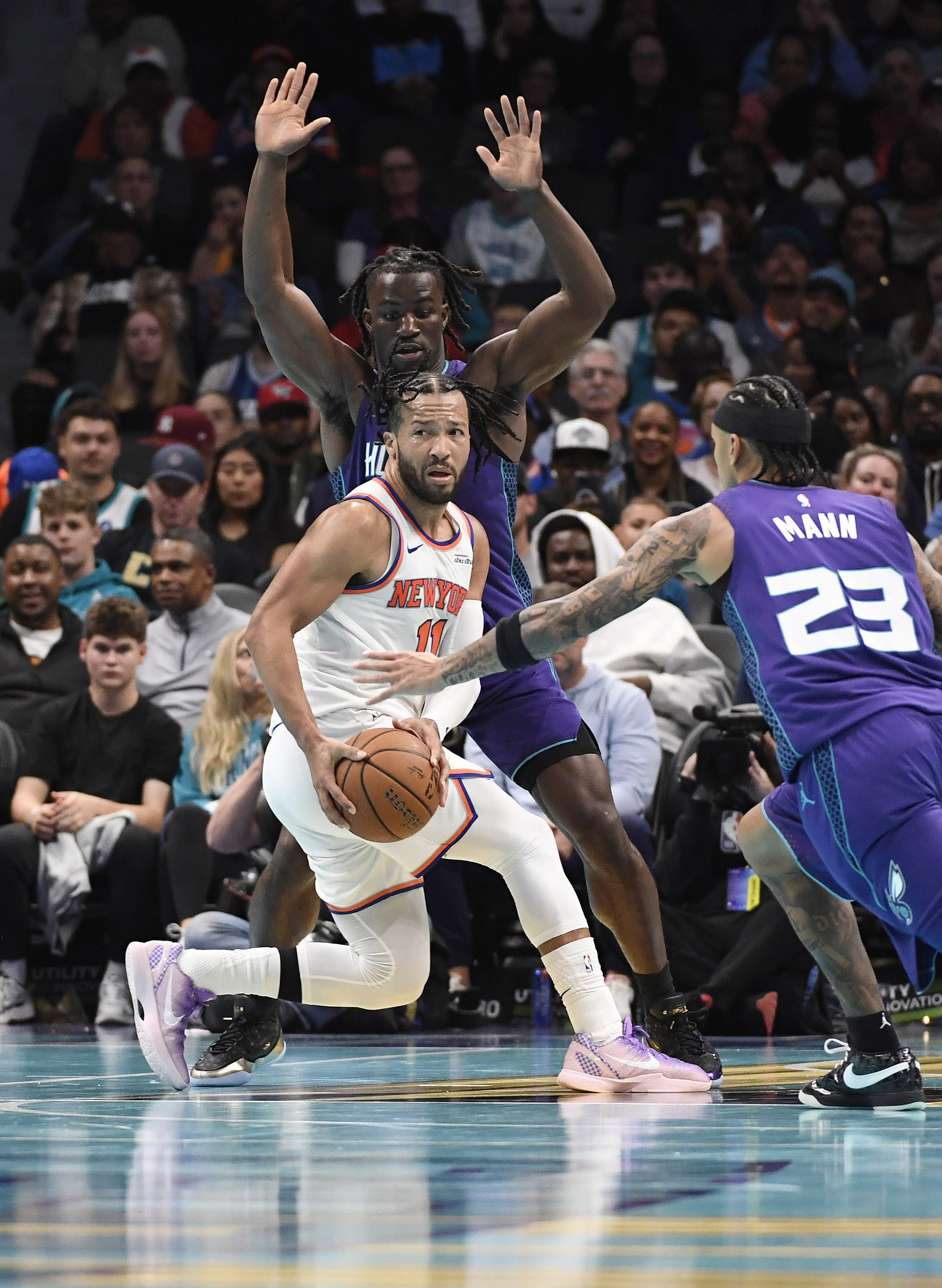 Nov 26, 2025; Charlotte, North Carolina, USA; New York Knicks guard Jalen Brunson (11) looks to pass during the second half against the Charlotte Hornets at the Spectrum Center. Mandatory Credit: Sam Sharpe-Imagn Images