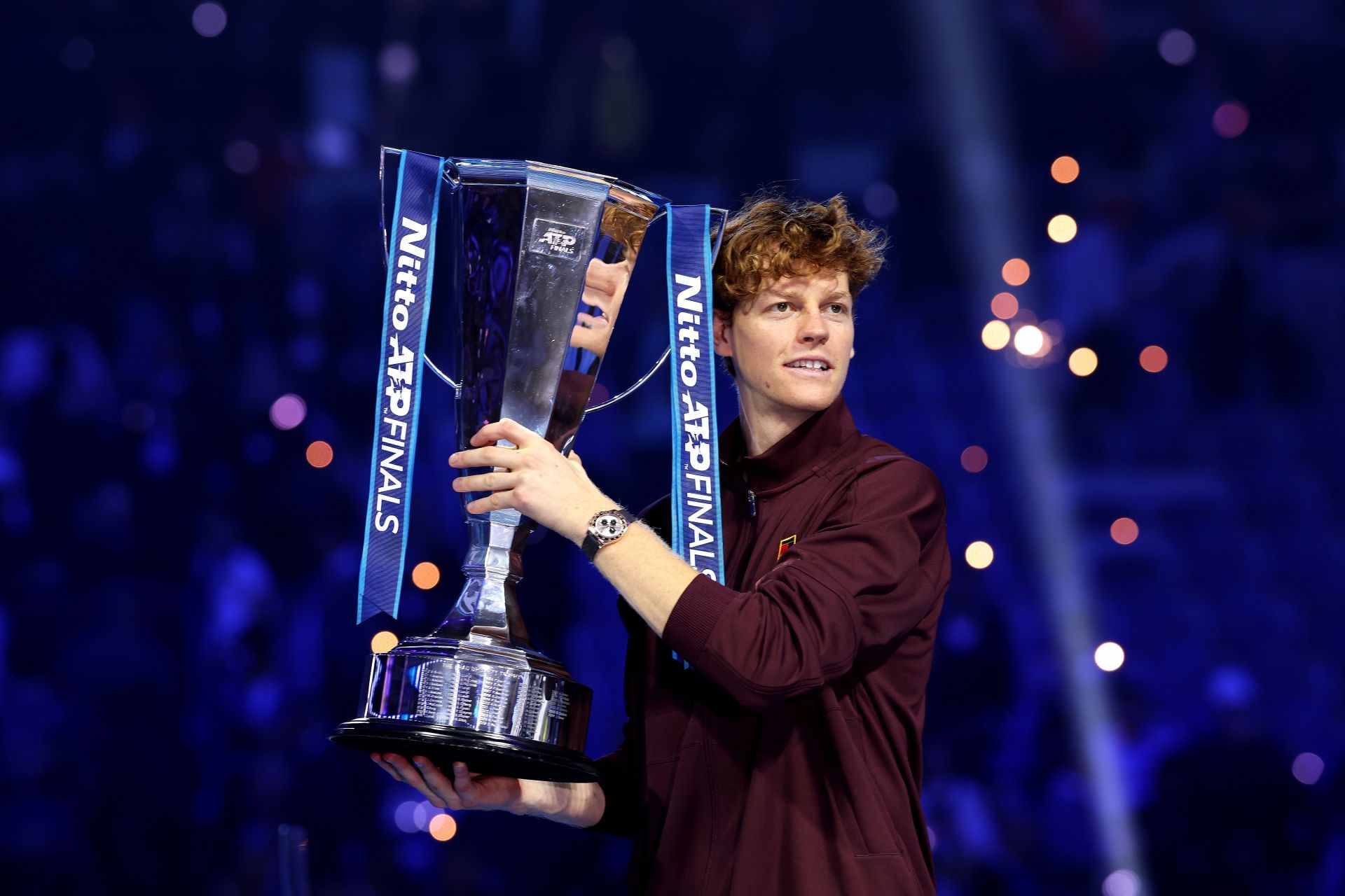 Jannik Sinner poses with the 2025 ATP Finals men&#039;s singles trophy (Source: Getty)