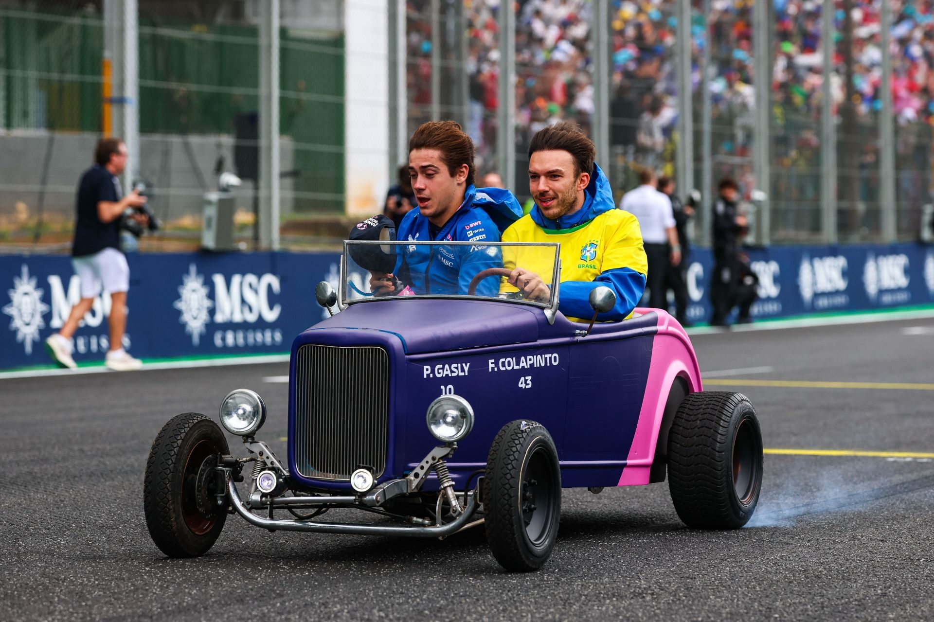 Franco Colapinto of Argentina and Pierre Gasly of France and Alpine F1 Team on the driver&#039;s parade during the F1 Grand Prix of Brazil at Autodromo Jose Carlos Pace on November 9, 2025 in Sao Paulo, Brazil. - Source: Getty