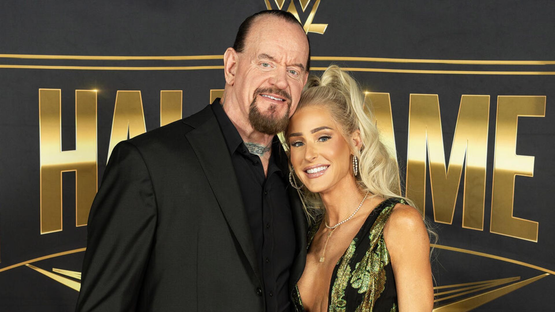 The Undertaker and Michelle McCool! [Image from WWE.com]