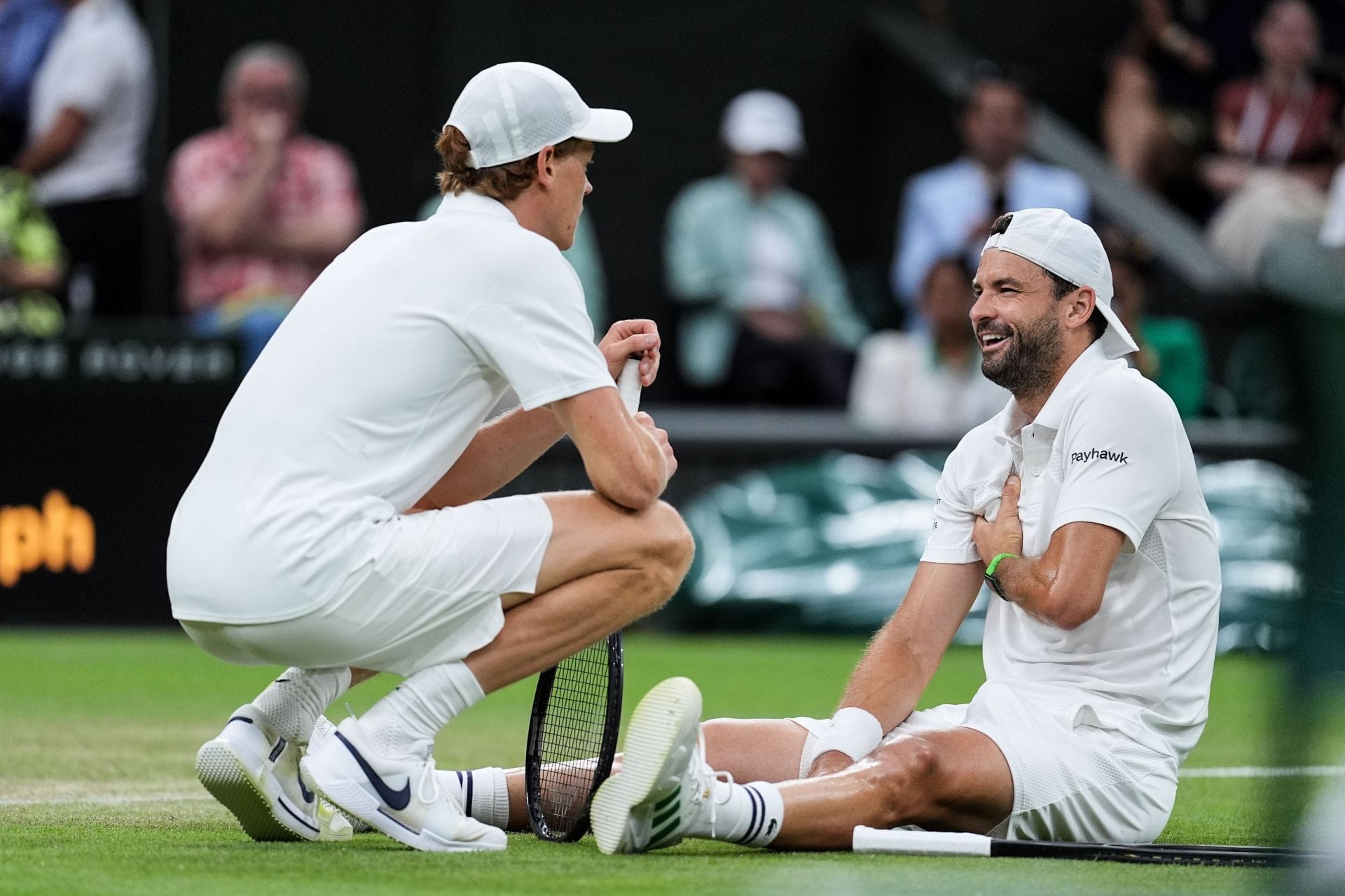 Jannik Sinner and Grigor Dimitrov at Wimbledon 2025 - Source: Getty