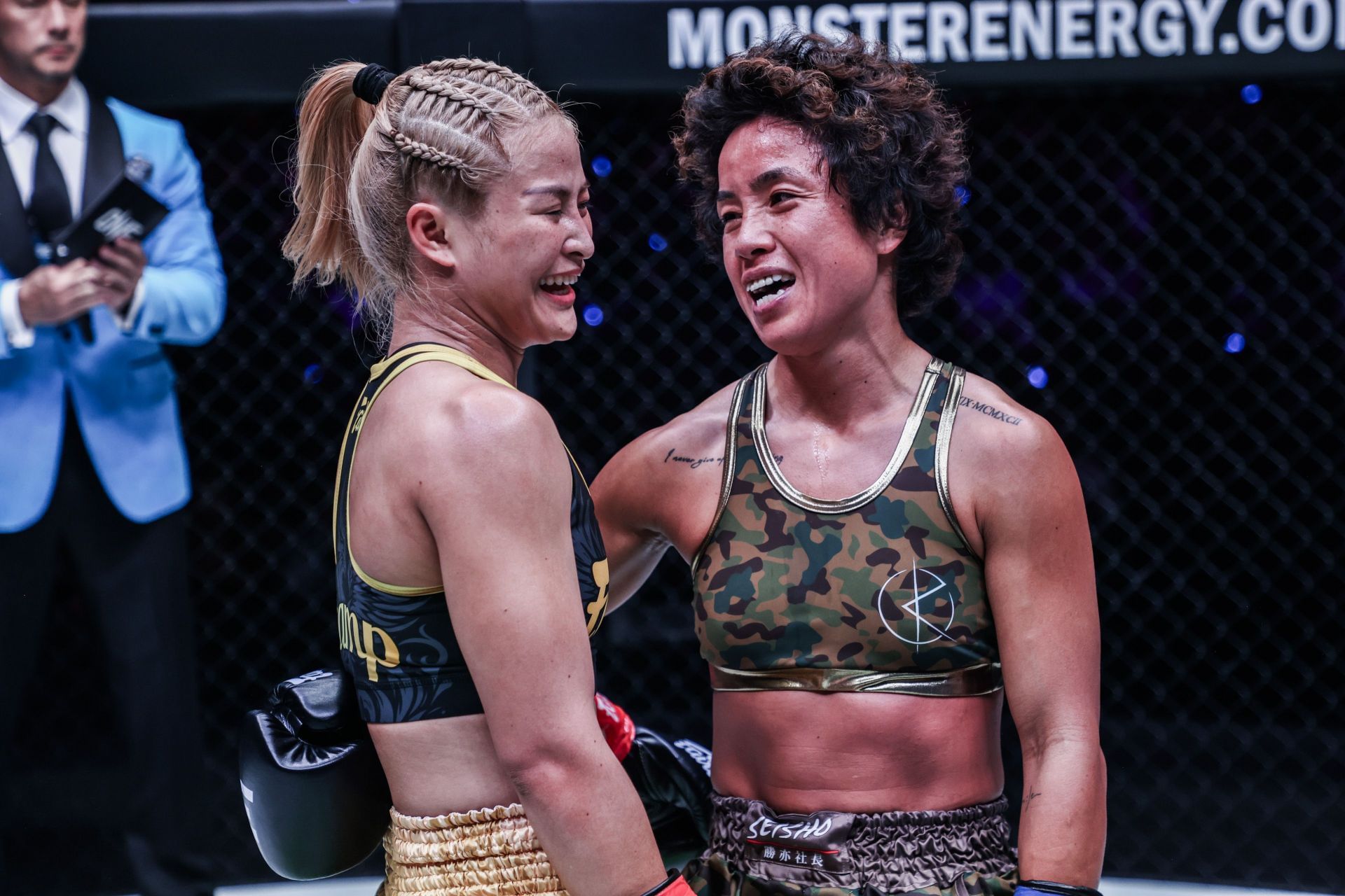 (From left) Stamp Fairtex and Kana Morimoto share a moment following their kickboxing contest in Tokyo. [Image: ONE Championship]