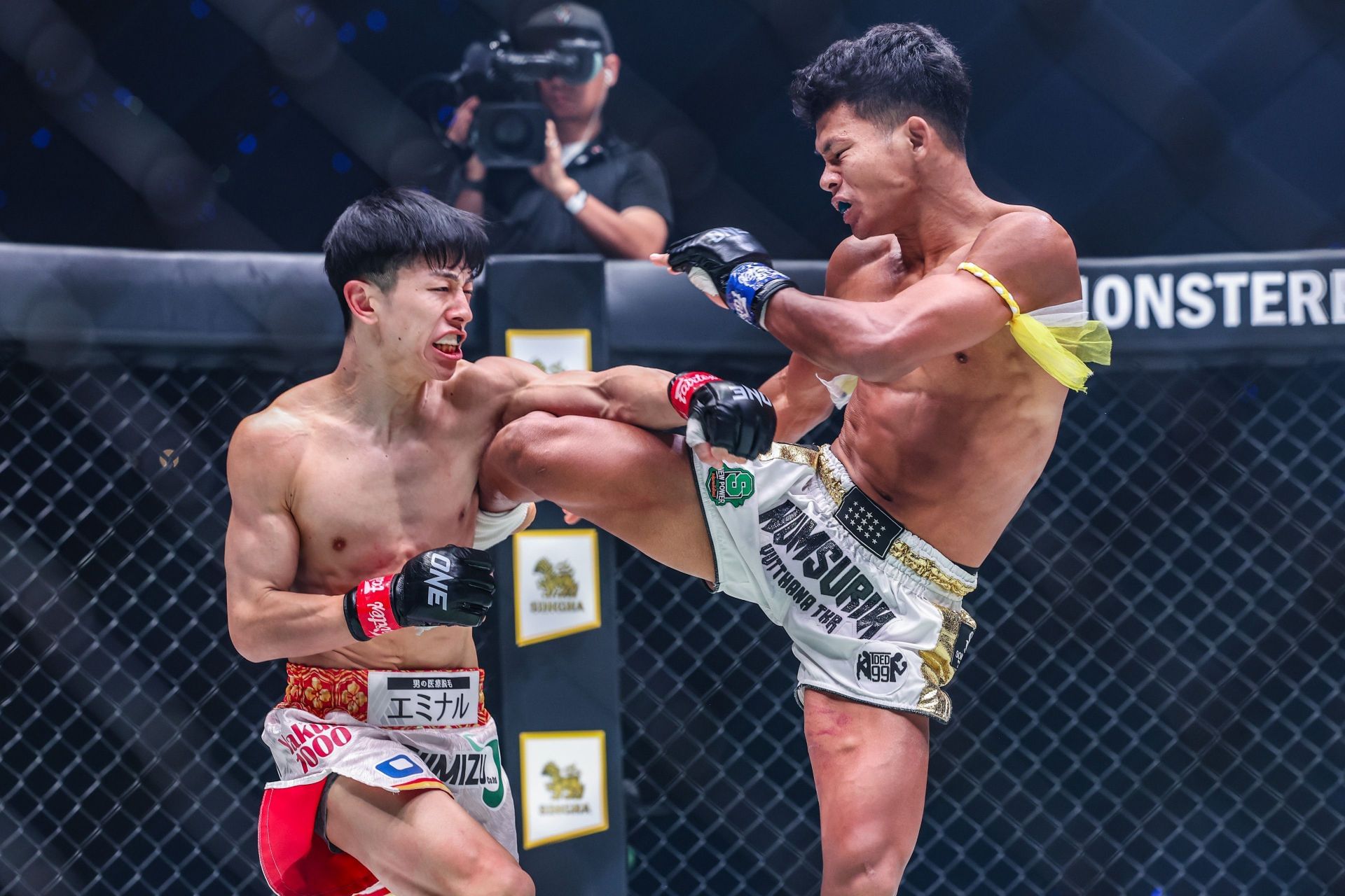 Nadaka (L) gives props to Numsurin for his granite chin | Image by ONE Championship