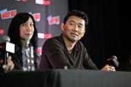 Simu Liu speaks onstage at First Look at Peacock's Espionage-Thriller Series- The Copenhagen Test during New York Comic Con 2025 (Image via Getty)