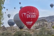 Pennywise floats above Cappadocia in "IT: Welcome To Derry" hot air balloon (Image via Getty)