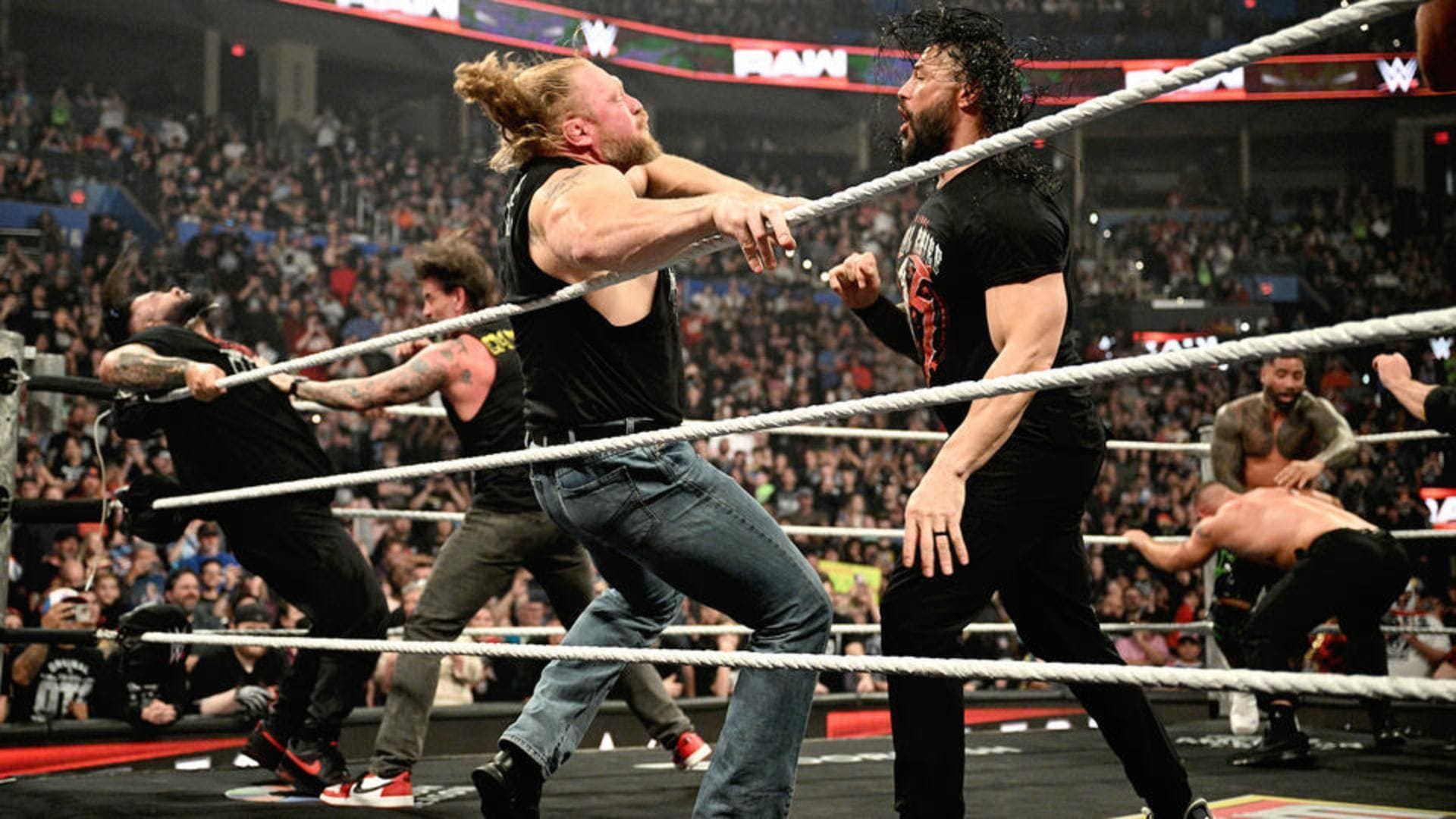 Roman Reigns and Brock Lesnar going at it on an episode of RAW [Image: WWE.com]
