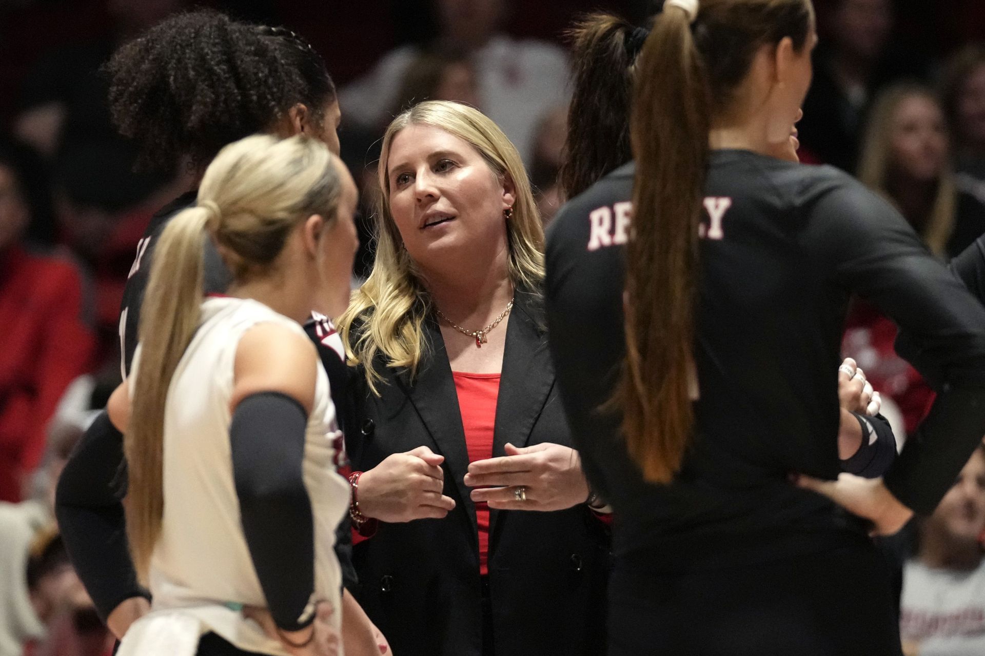 Dani Busboom Kelly with Nebraska Volleyball team members [Image Source : Getty] 