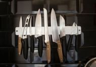 Recovered tools reportedly matched knives absent from the apartment (Image via Unsplash)