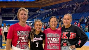 Nebraska Volleyball's Maisie Boesiger reacts as her mother wins major coaching honor