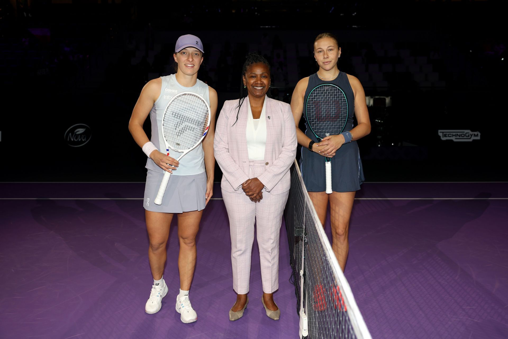 Swiatek at the WTA Finals 2025 with Amanda Anisimova - Image Source: Getty
