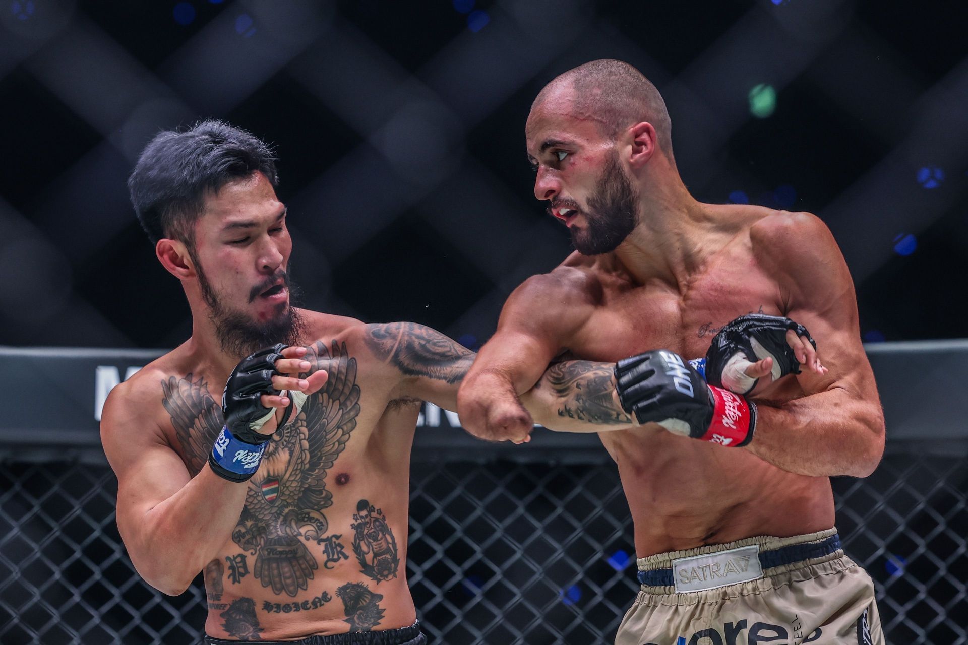 Suakim (left) and Jake Peacock (right) in action at ONE 173. [Image: ONE Championship]