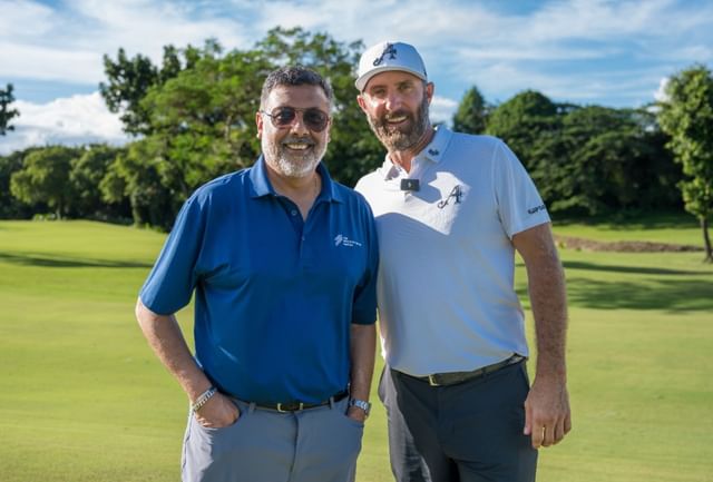 Rahul Singh with Dustin Johnson at International Series Philippines (Image via The International Series)