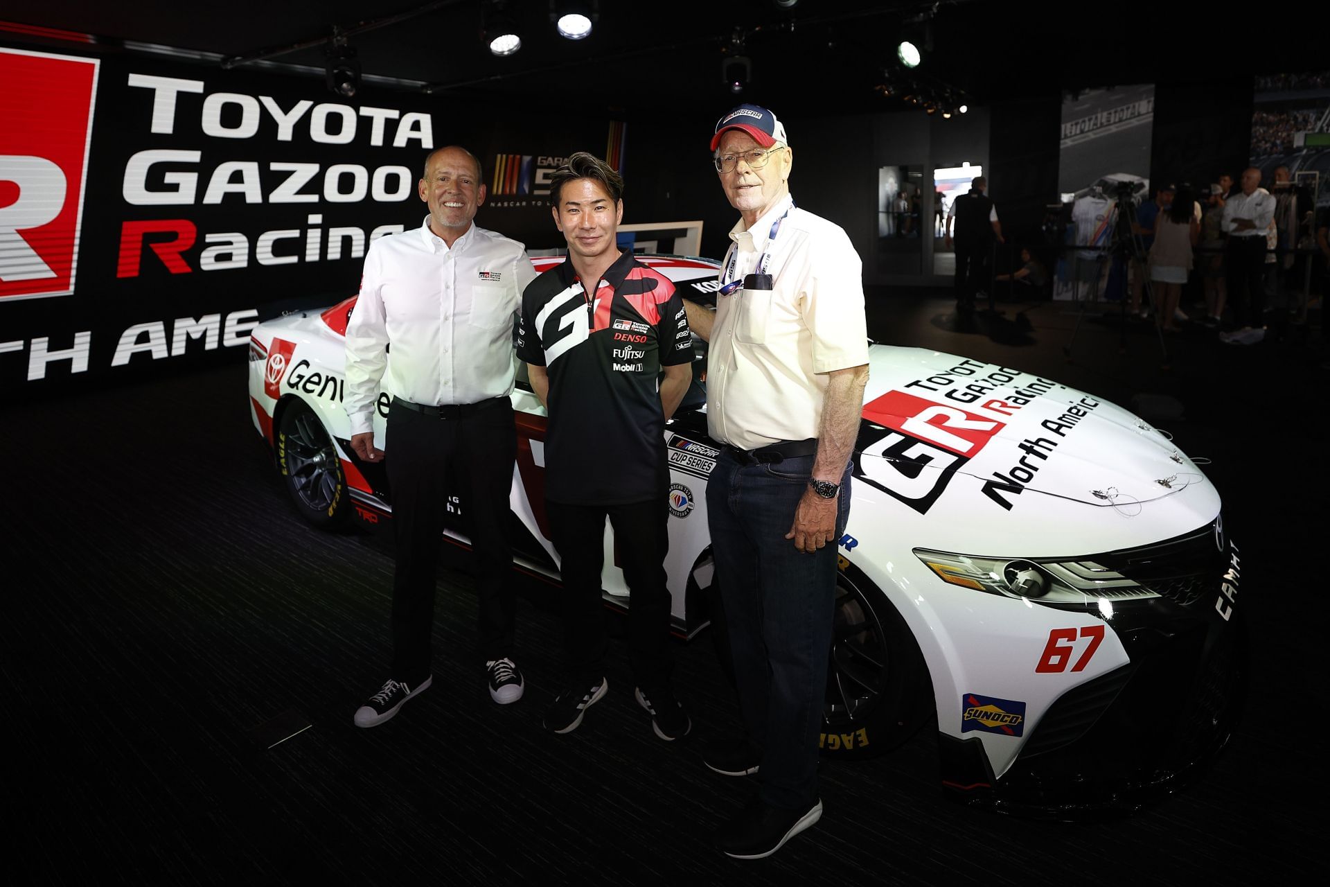 (L-R) TRD president David Wilson, Kamui Kobayashi and Jim France, before the 100th 24 Hours of Le Mans, 2023 (Credits: Getty)