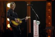 Keith Urban at the Opry 100 (Image via Jason Kempin/Getty Images)