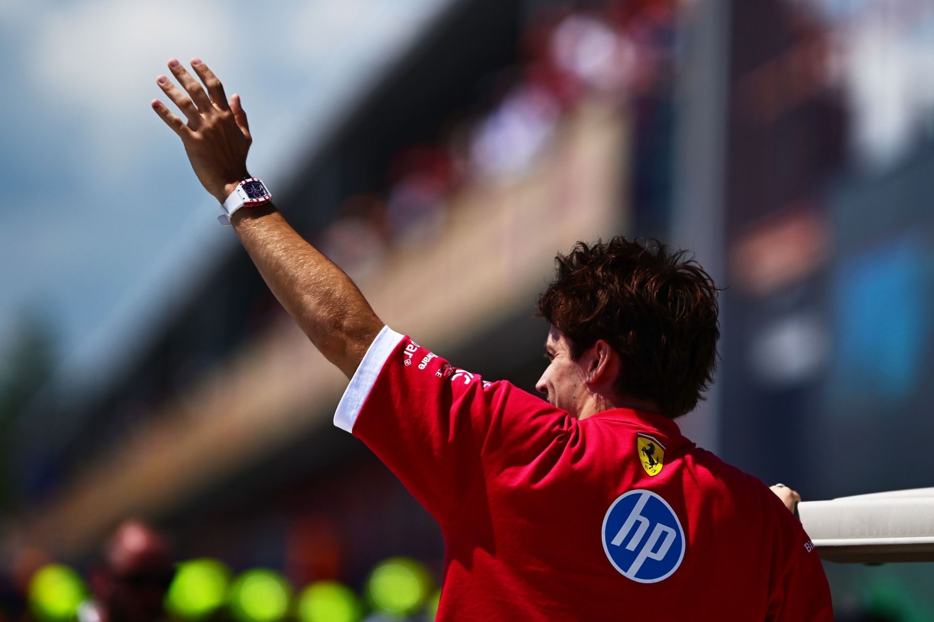 Charles Leclerc of Scuderia Ferrari waves before the Emilia-Romagna Grand Prix. Source: Getty