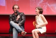 (L-R) David Harbour and Millie Bobby Brown at Stranger Things Netflix FYSee exhibit space (Image via Getty)
