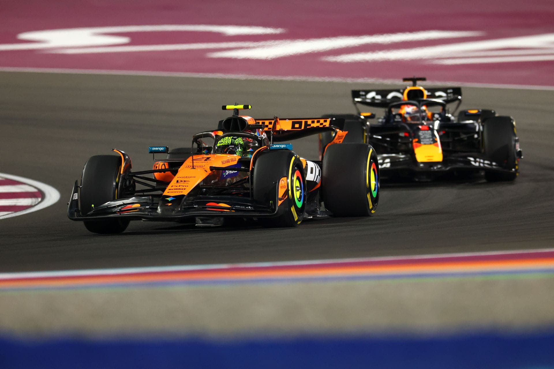 Lando Norris of Great Britain driving the (4) McLaren MCL39 Mercedes leads Max Verstappen of the Netherlands driving the (1) Oracle Red Bull Racing RB21 on track during the Sprint ahead of the F1 Grand Prix of Qatar at Lusail International Circuit - Source: Getty
