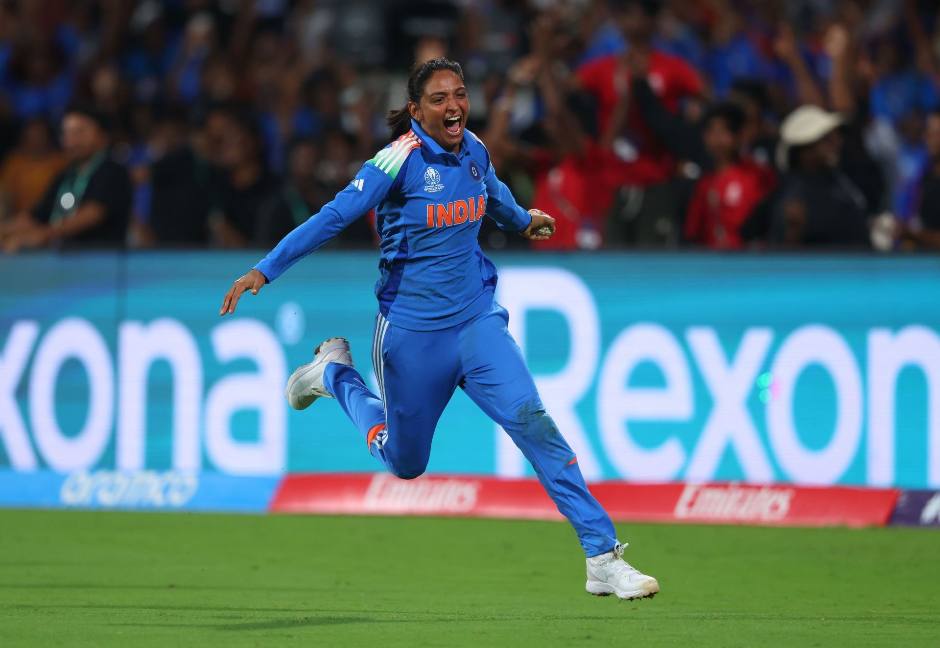 Harmanpreet Kaur celebrates after taking the winning catch in the final. (Image Credits: Getty)