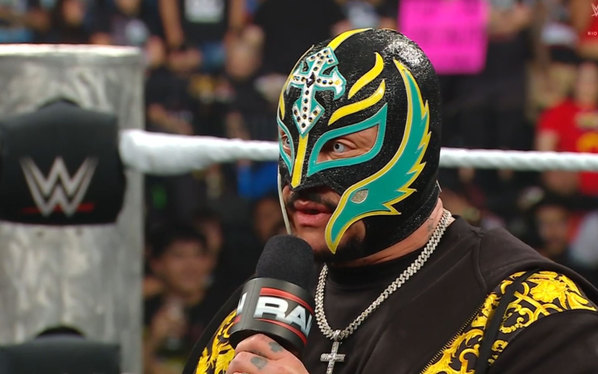 Rey Mysterio returns to WWE RAW and takes out current Champion in his first appearance back
