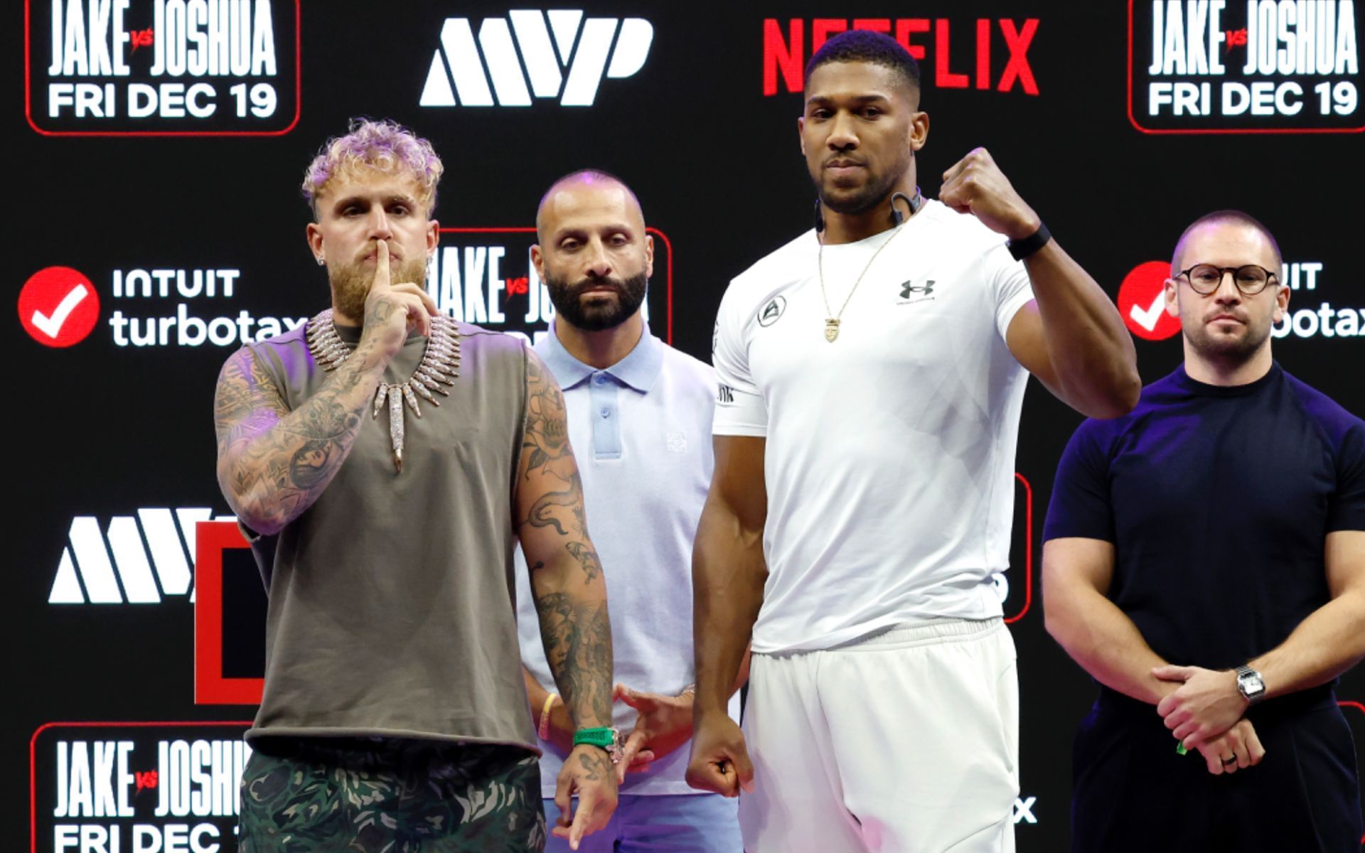Anthony Joshua (right) fires back at Jake Paul