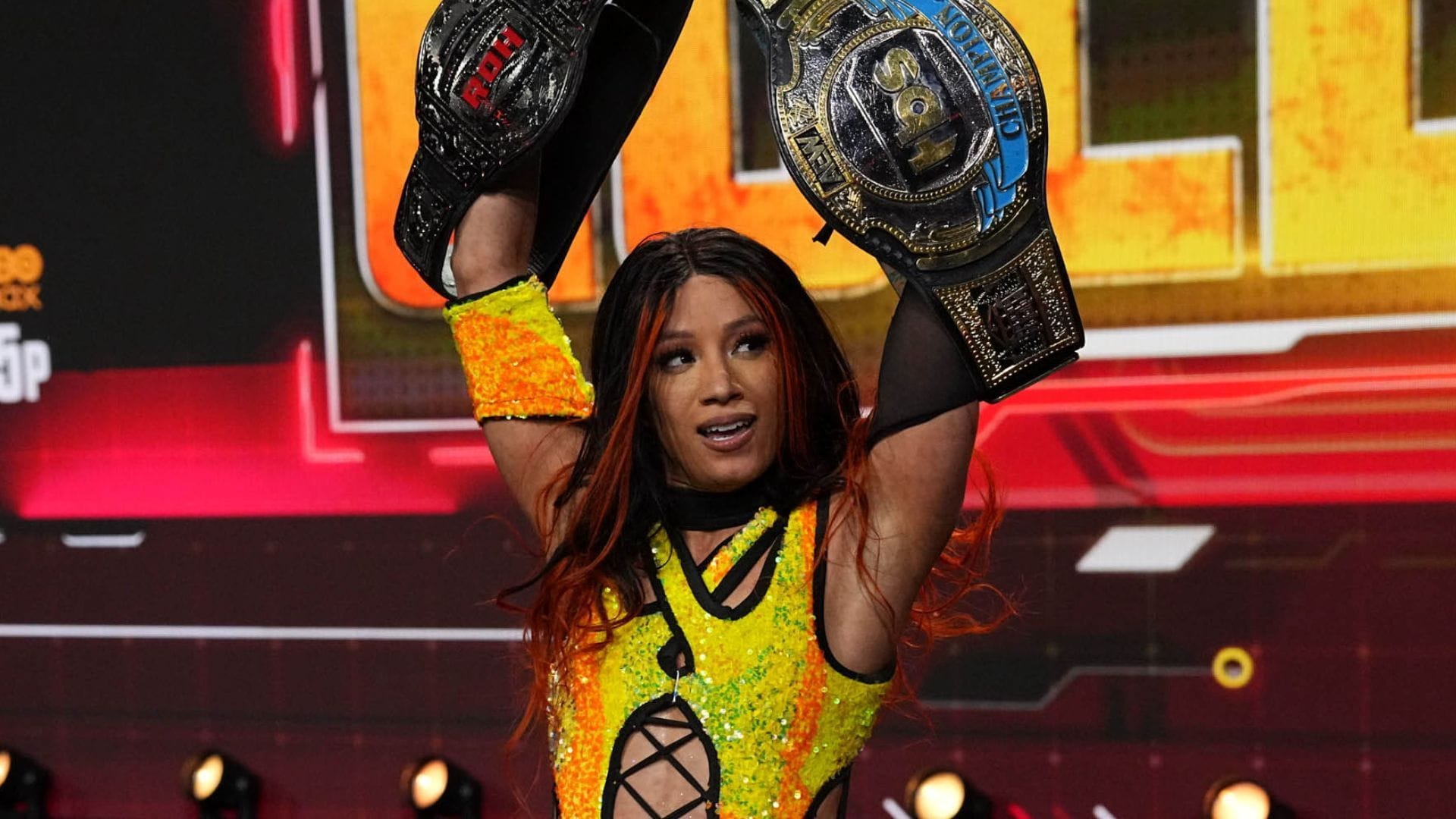 Mercedes Mon&eacute; is a belt collector [photo: allelitewrestling.com]