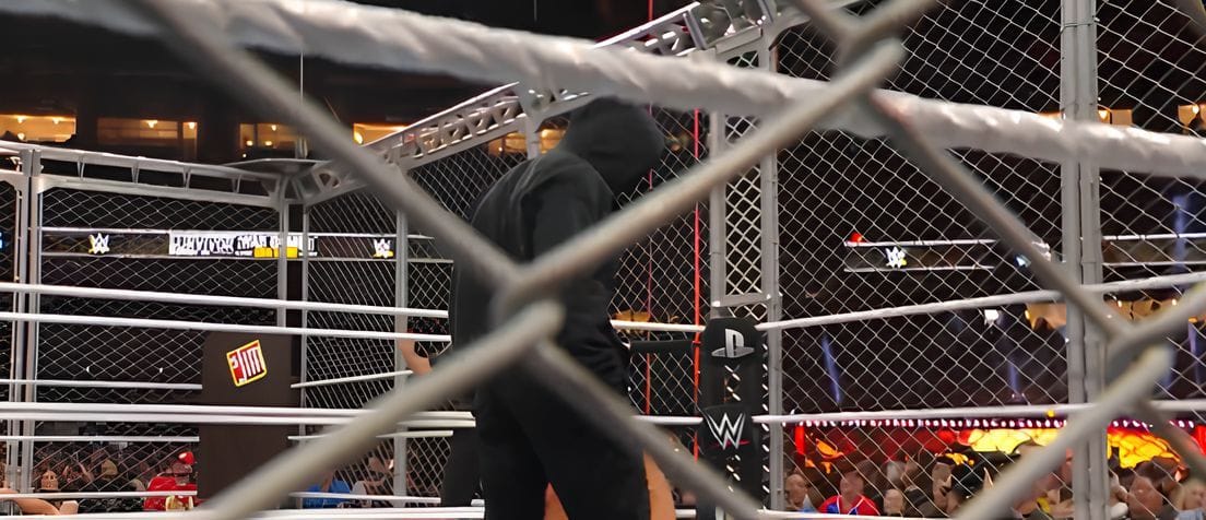 A mystery attacker appears during WarGames (Image source: WWEYOUTUBE)